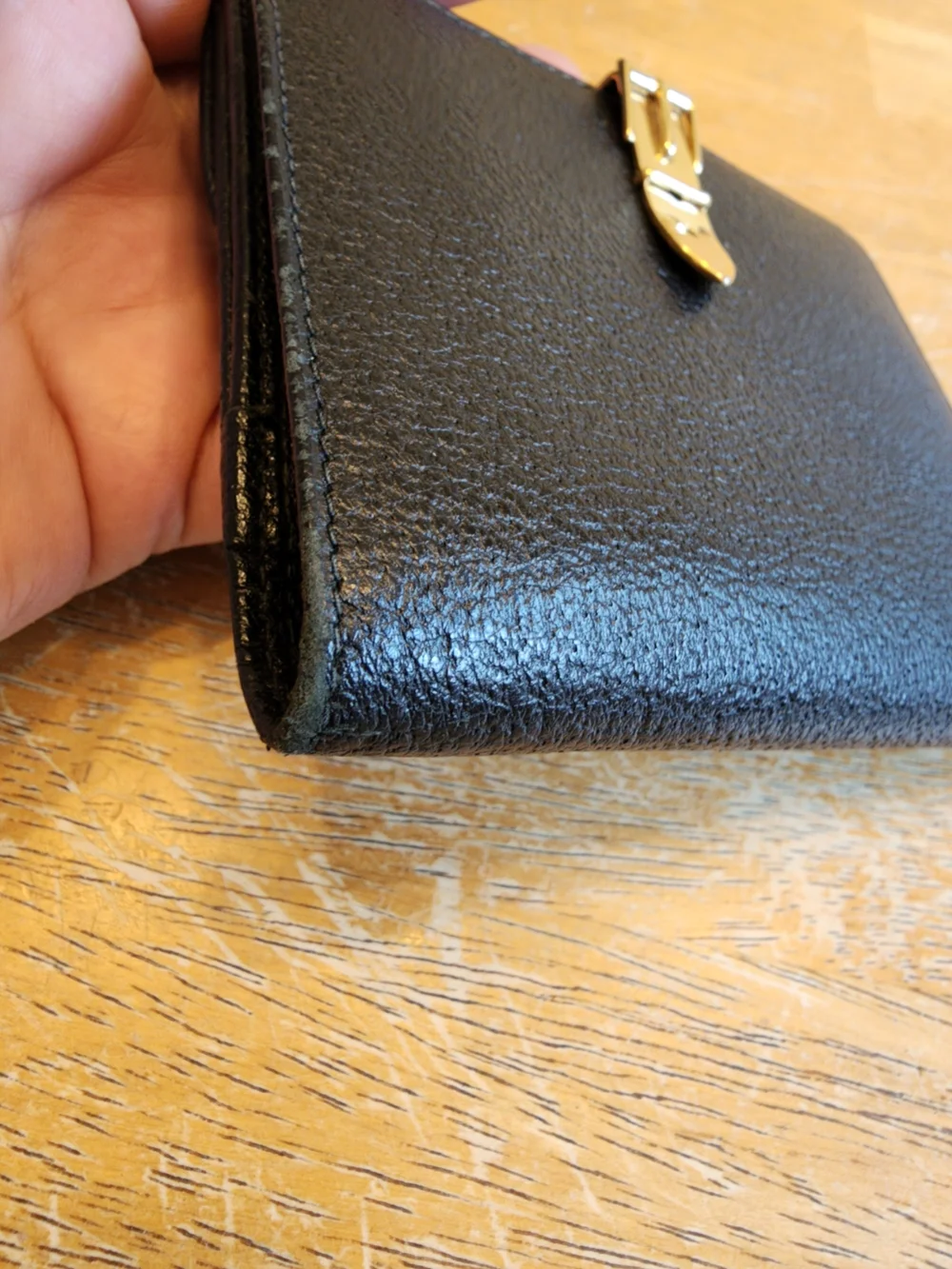 vintage Gucci black textured leather compact bifold wallet